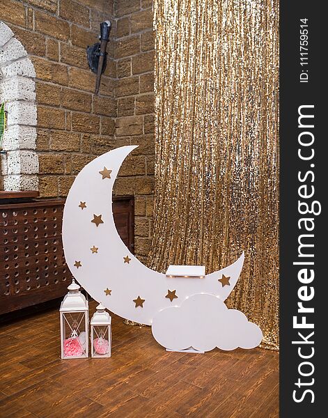 Children`s photo zone with a month and a stars. DÃ©cor