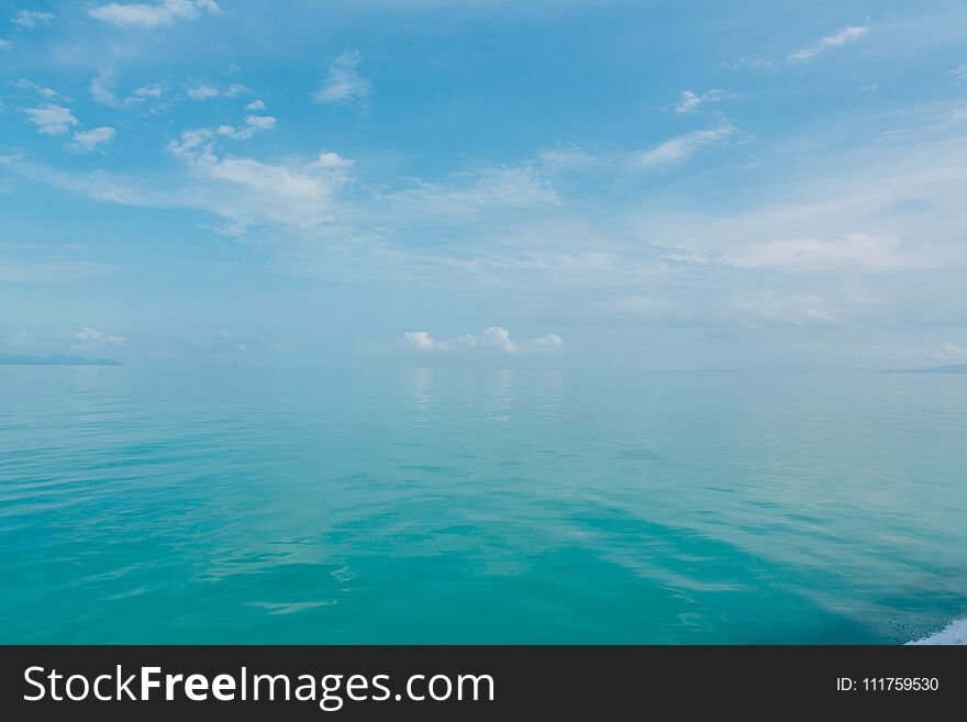 Blue sea with white clouds abstract background pattern. Blue sea with white clouds abstract background pattern