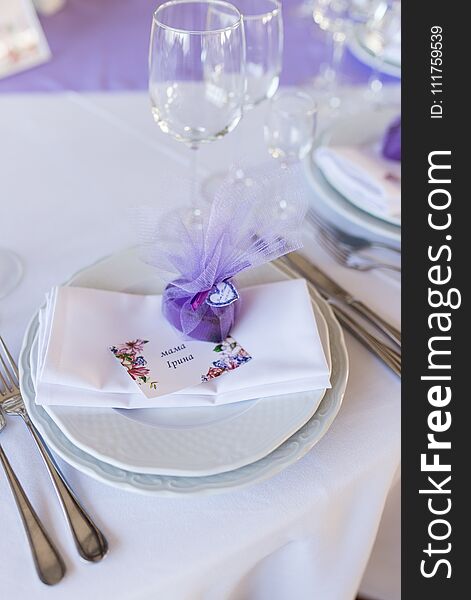 A Wedding Purple Bonbonniere In A Shape Of Heart Lying On A White Plate
