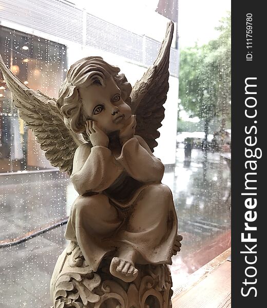 Angel statue in cafeteria. Angel statue in cafeteria