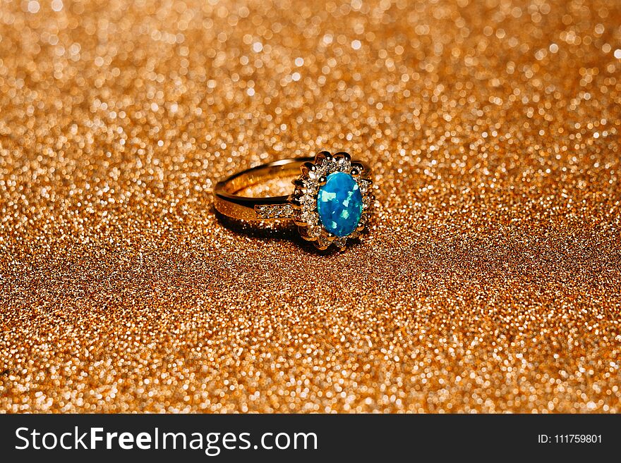 Gold Ring with Blue Opal