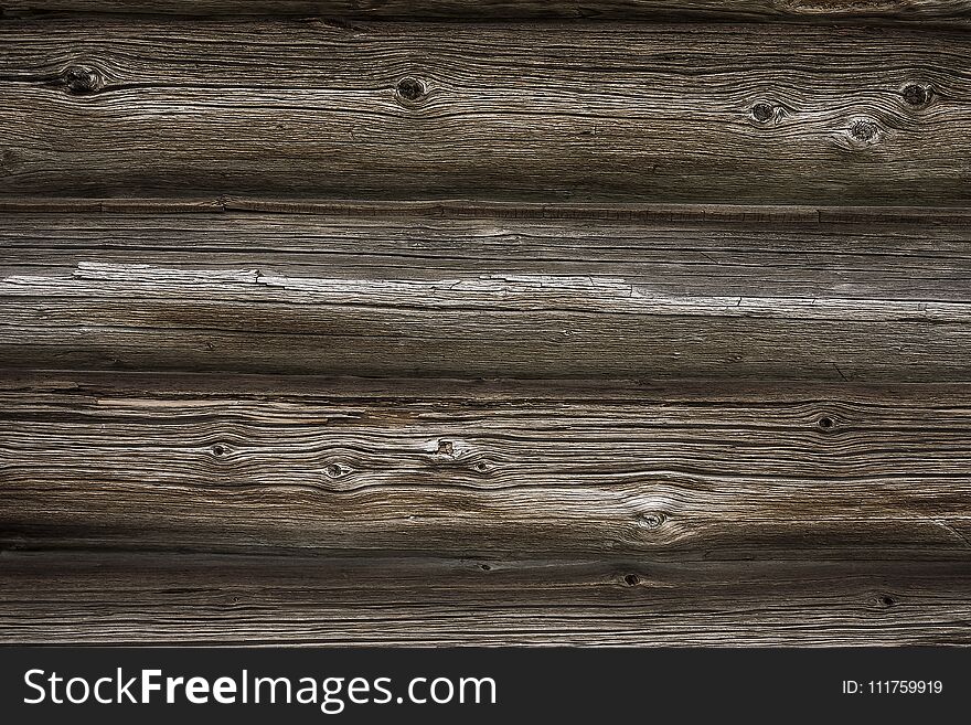 Texture of old weathered tree close - up outdoors. Logs and boards. Texture of old weathered tree close - up outdoors. Logs and boards.
