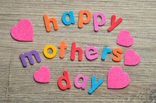 Happy Mothers Day In Colorful Letters With Pink Hearts Stock Photography