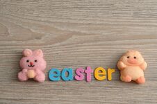 A Pink Bunny Shape Marshmallow And A Chicken Shape Marshmallow With The Word Easter Stock Image