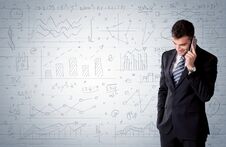 Salesman Standing With Drawn Graph Charts Royalty Free Stock Photography