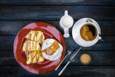 Delicious Dessert. Meringue With Pineapple And Fresh Coffee And Milk On A Colored Wooden Background. Top View Royalty Free Stock Images Delicious Dessert. Meringue With Pineapple And Fresh Coffee And Milk On A Colored Wooden Background. Top View Royalty Free Stock Images