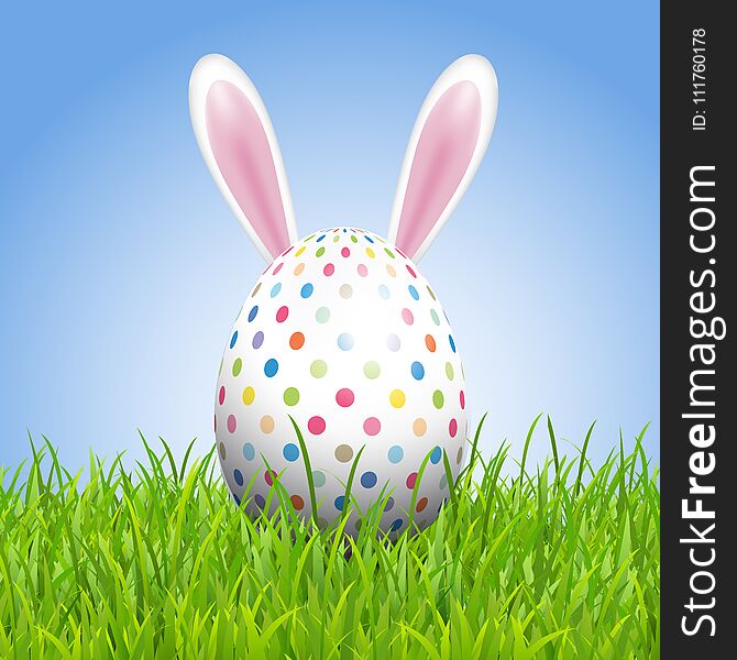 Easter Background With Bunny Ears And Egg In Grass