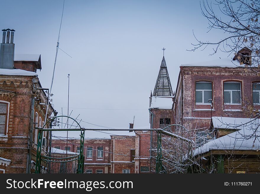 Vintage style red brick building, old factory, winter time landscape. Vintage style red brick building, old factory, winter time landscape.