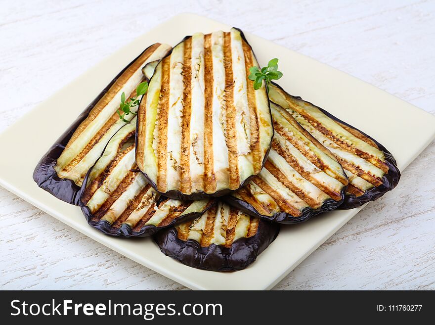 Grilled eggplant with thyme on the plate