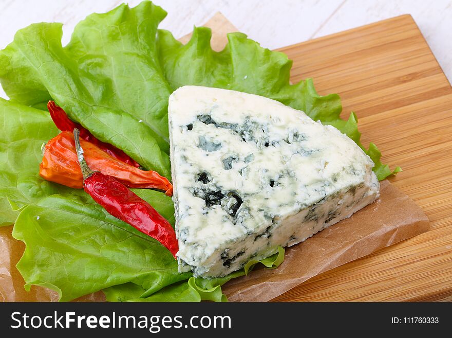 Roquefort cheese with pepper and salad leaves