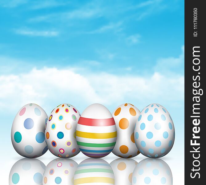 Colourful Easter eggs on a blue sky background