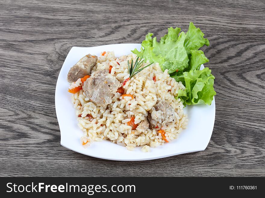 Pilau rice with meat and carrot