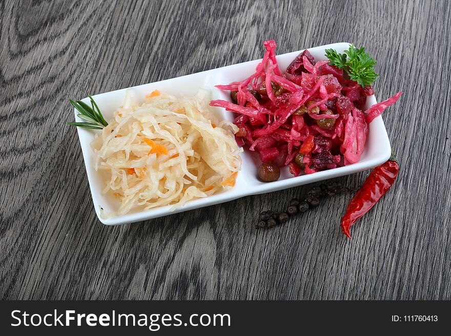 Viniagrette and fermented cabbage snacks with parsley