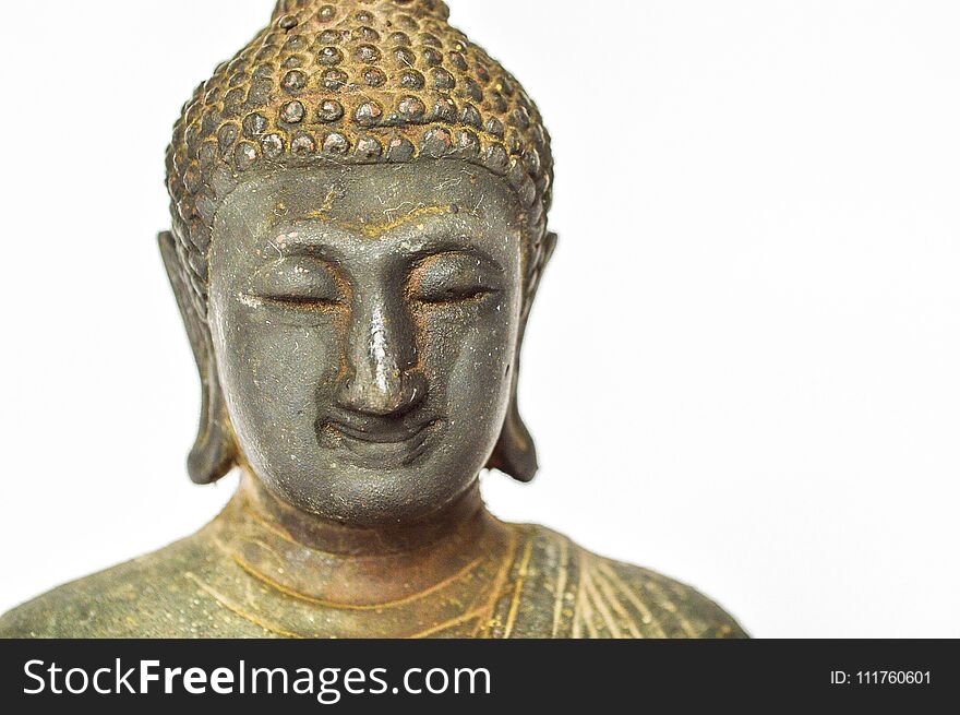 Close up buddha statue on white background