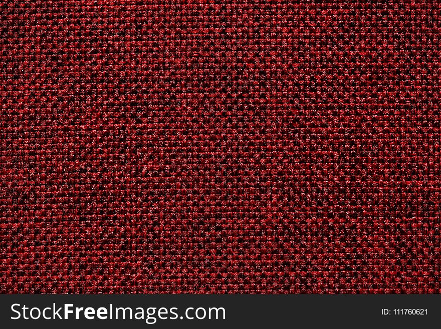 Awesome material texture in effective red tone. High resolution photo.