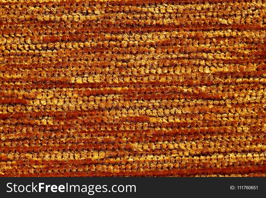 Saturated Golden Textile Background.