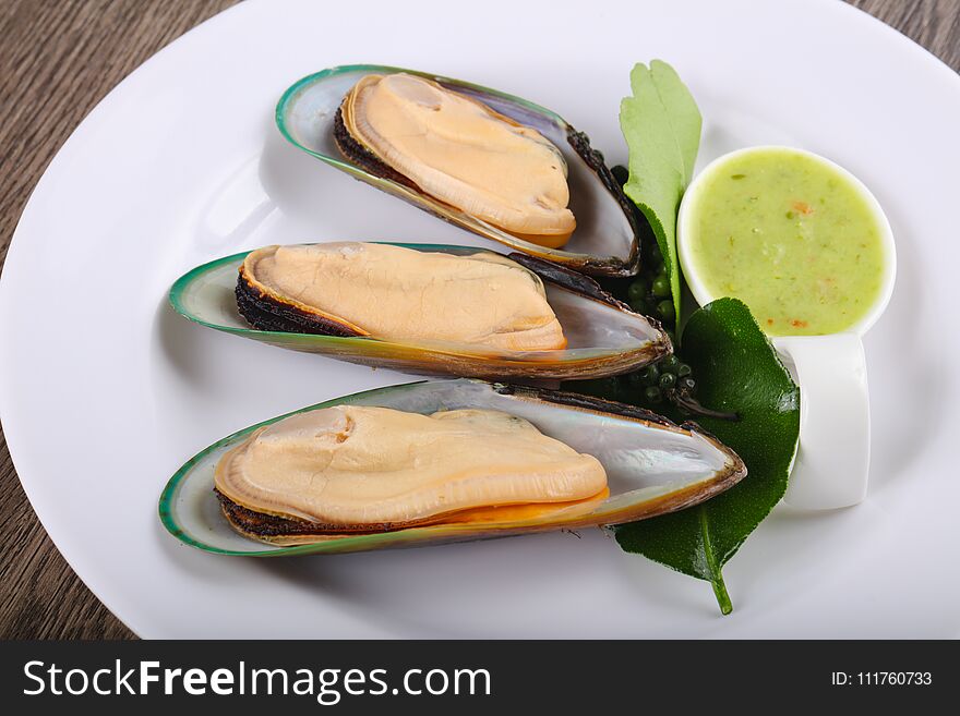New Zealand Mussels on the plate with garlic