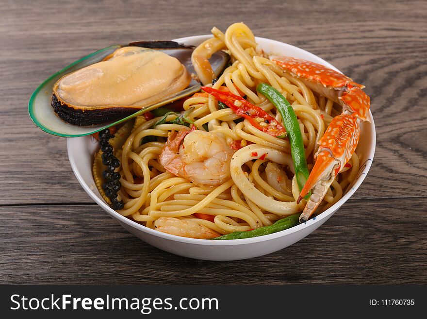 Seafood spaghetti with mussels, crab and shrimp