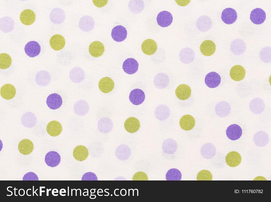 Close Up Of Texture With Orange And Purple Dots On White Backgro