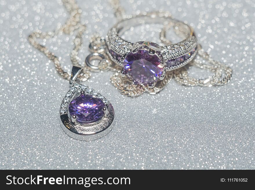 Fashion silver pendant with purple zirconia, amethyst imitation.