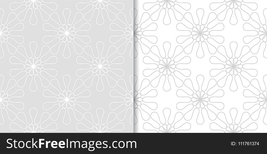 Light gray floral ornaments. Set of seamless patterns