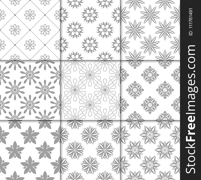 Gray and white floral ornaments. Collection of neutral seamless patterns for paper, textile. Gray and white floral ornaments. Collection of neutral seamless patterns for paper, textile