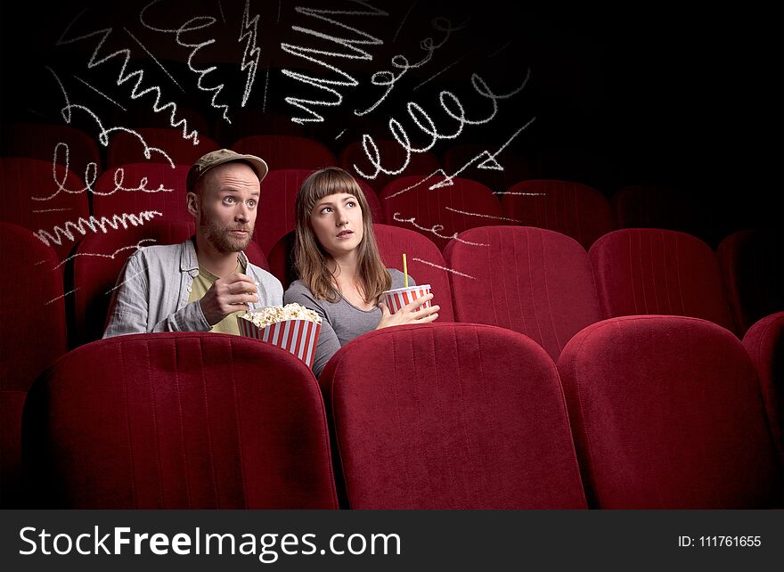 Cute Couple In Cinema Watching Movie