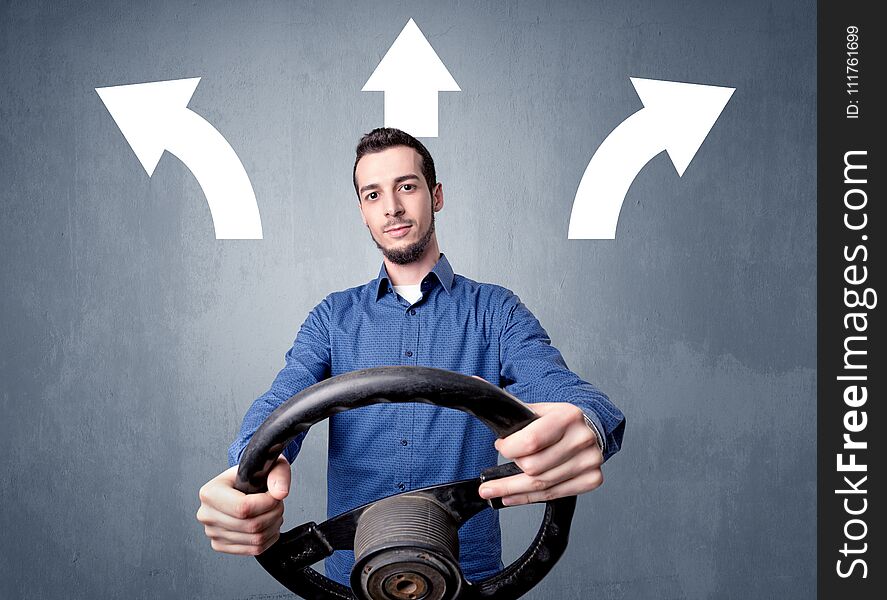 Man holding steering wheel