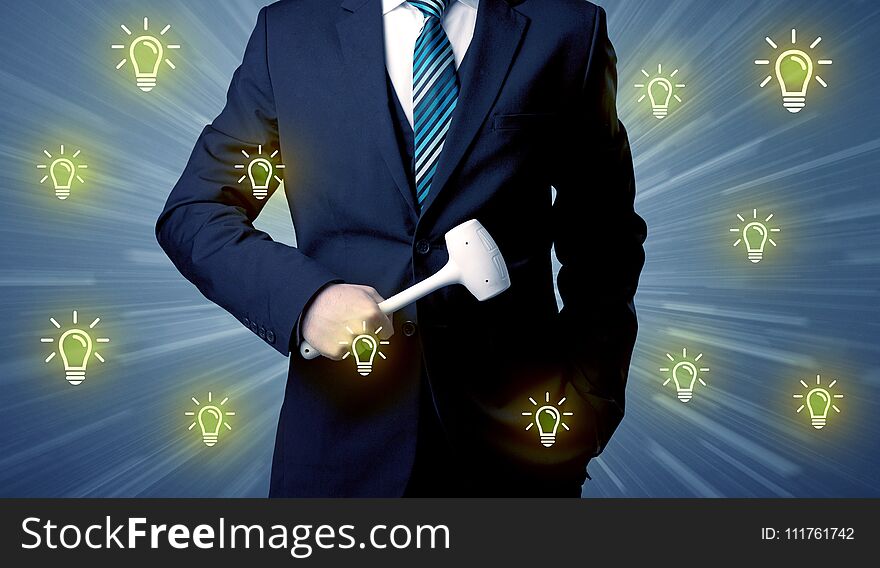 Better-looking businesman holding tool with idea bulbs concep. Better-looking businesman holding tool with idea bulbs concep