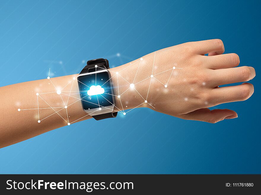 Naked female hand with smartwatch and with cloud technology and connection symbol. Naked female hand with smartwatch and with cloud technology and connection symbol