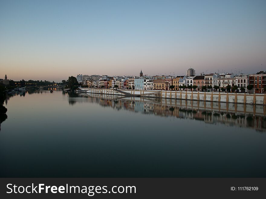 The Colors Of The Popular District Of Triana Along The Guadalquivir