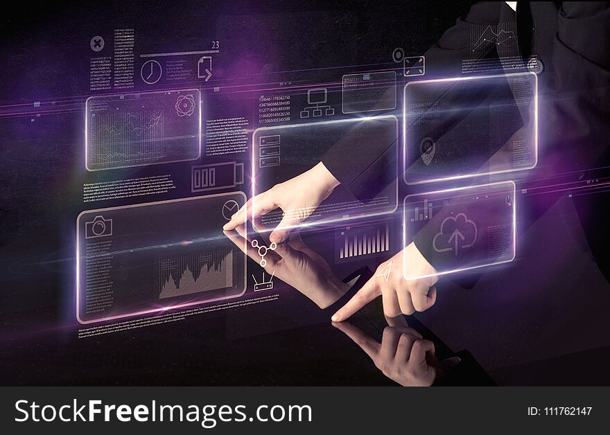 Male hands touching interactive table with purple cloudspace graphic on it