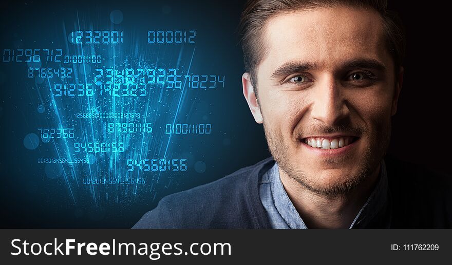 Portrait of a young businessman on dark background