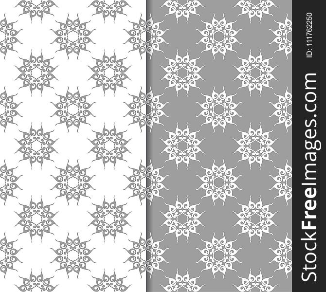 White and gray floral backgrounds. Set of seamless patterns for textile and wallpapers