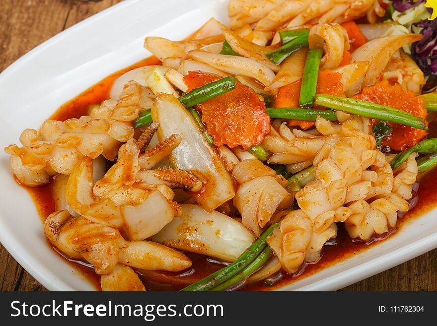 Squid in sauce with spices - Asian cuisine