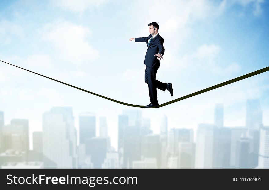 Salesman Walking On Rope Above The City