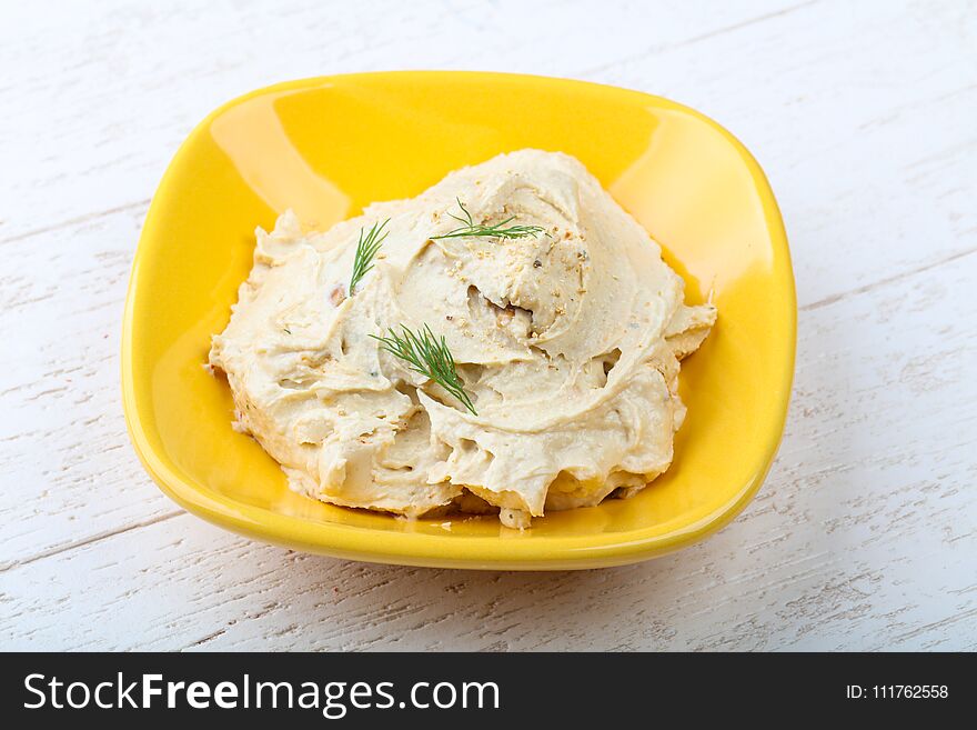 Arabic traditional cuisine - hummus with herbs and spices