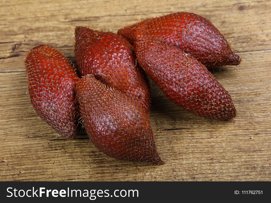 Asian fruit - sala on the wood background