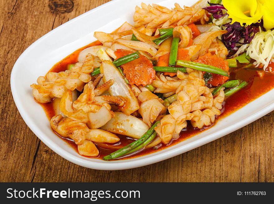 Squid in sauce with spices - Asian cuisine