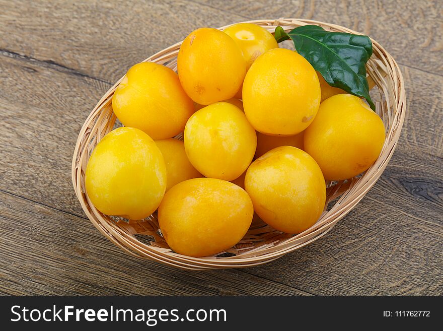 Fresh sweet ripe Yellow plums in the bowl