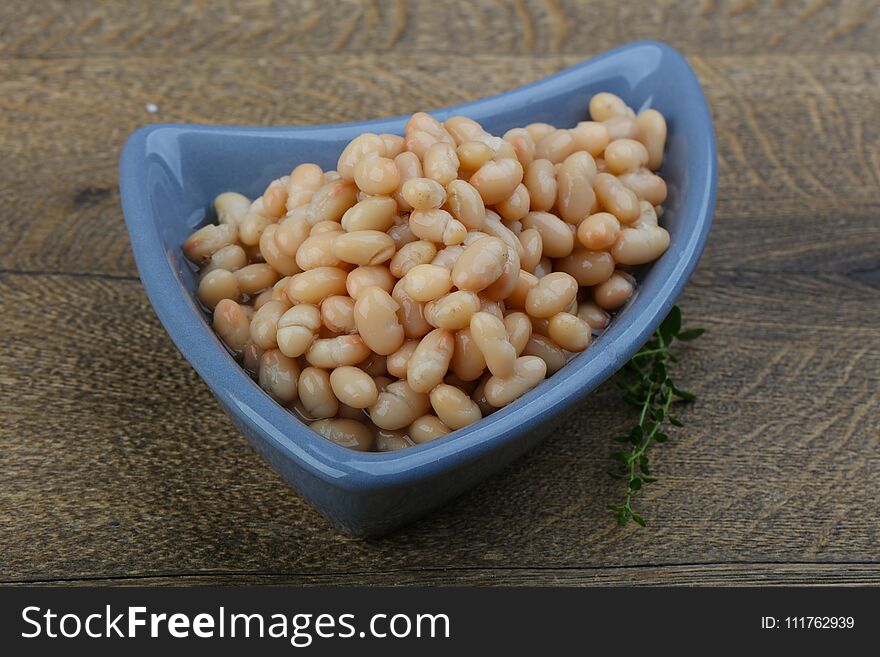 White canned kidney beans in the bowl. White canned kidney beans in the bowl