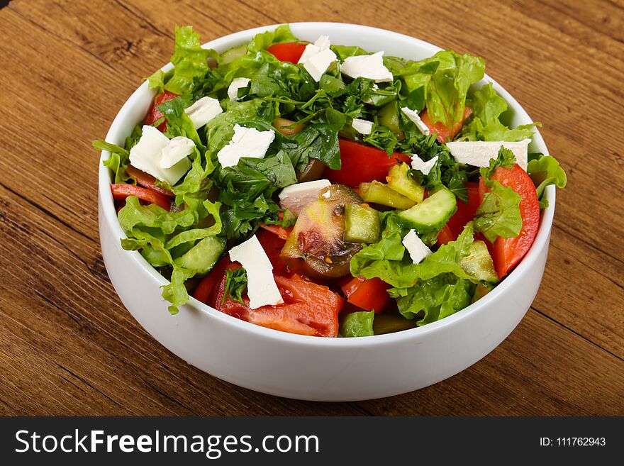 Greek salad with feta cheese and vegetables