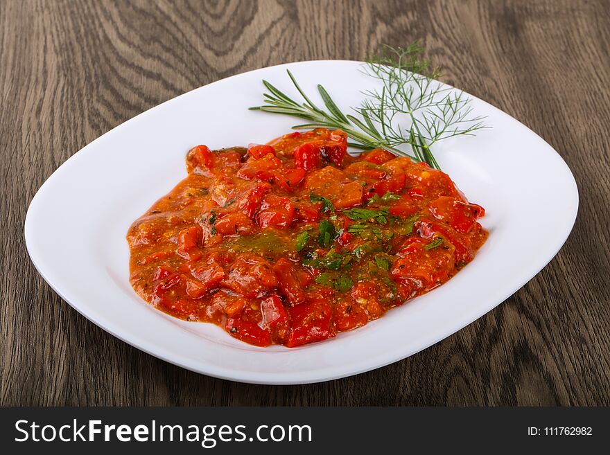 Grilled red bell pepper with tomato sauce