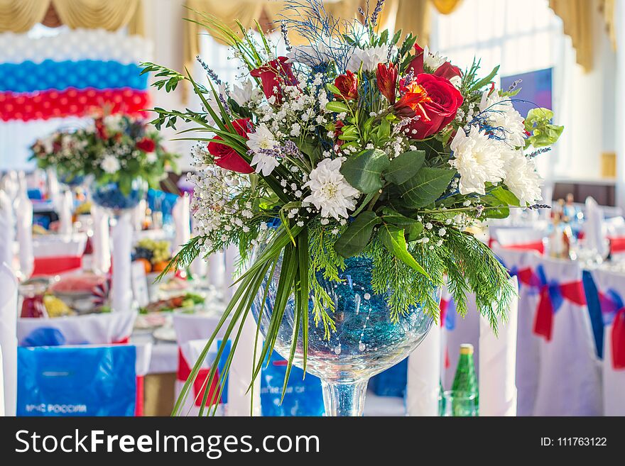 Beautiful colorful flower bouquet in glass vase