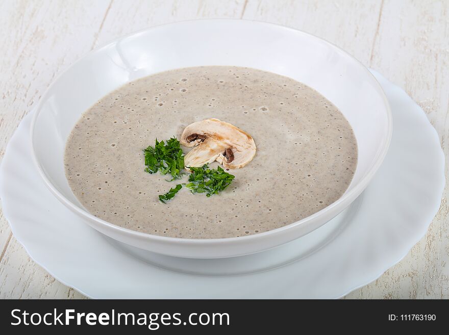 Mushroom cream soup with parsley and croutoon. Mushroom cream soup with parsley and croutoon