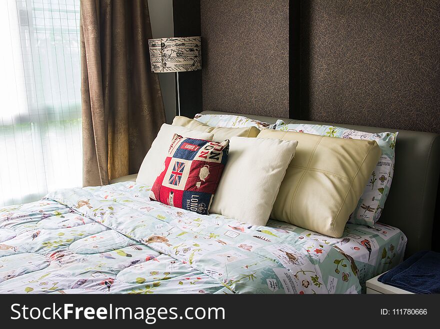 Empty modern bed in bedroom