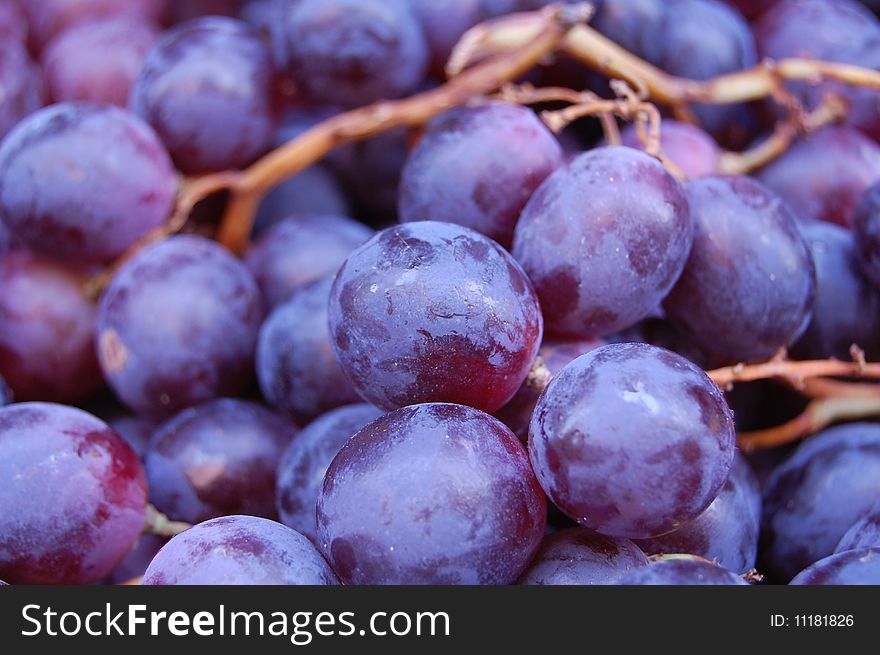 Purple grapes on a market. Purple grapes on a market