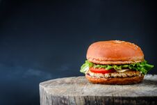 Appetizing Chickenburger On A Wooden Table Stock Image