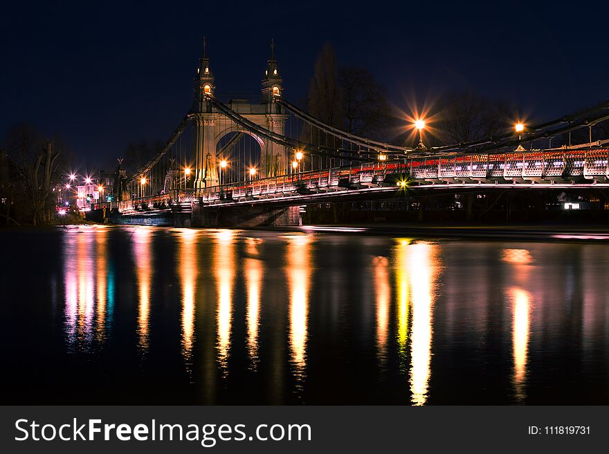 Spectacular British architecture of famous Hammersmith Bridge Thames River at night Capital of England London Europe. Spectacular British architecture of famous Hammersmith Bridge Thames River at night Capital of England London Europe