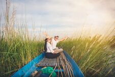 Free Portrait Of Beautiful Asian Woman And Man Sitting On Fishing Bo Royalty Free Stock Image - 111825766